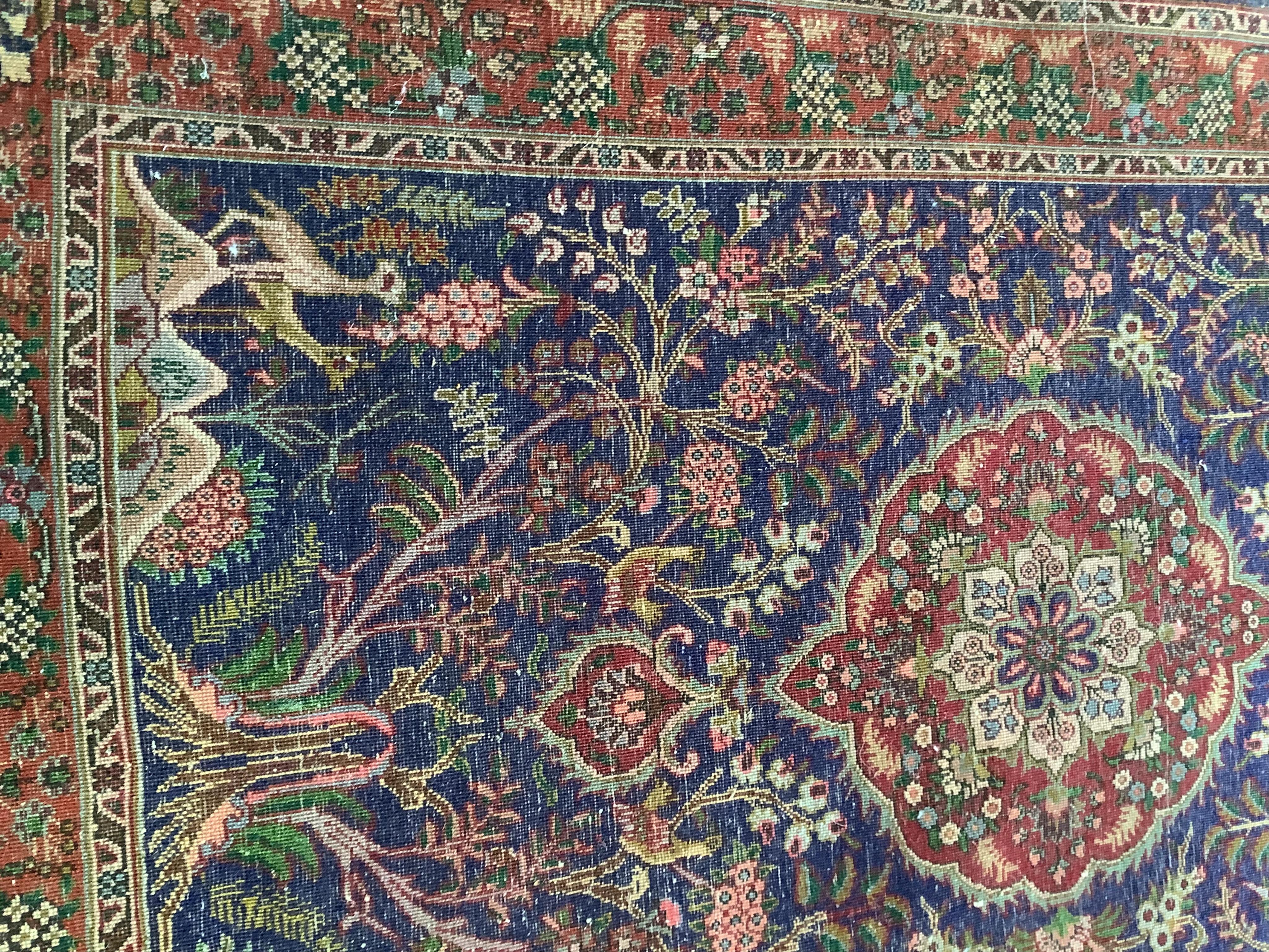 A Qom blue ground rug, 150 x 98cm. Condition - good